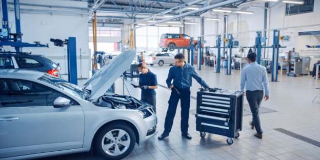 A person and person standing next to a car AI-generated content may be incorrect.